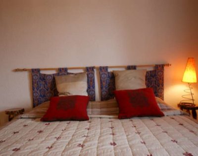 bedroom with night lamp inside villa apartment
