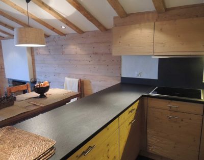 kitchen with wooden cupboards inside resort