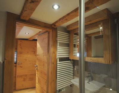 washroom with wooden door villa interior